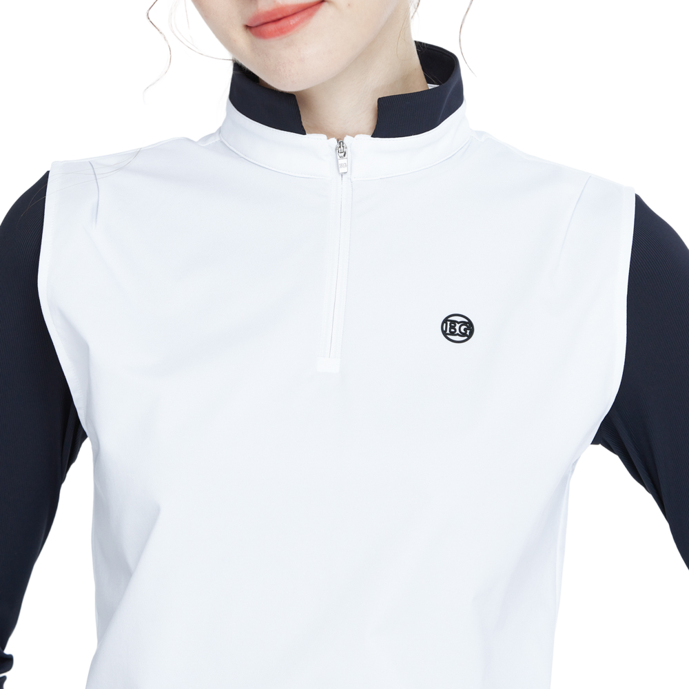 White long-sleeved vest with stand-up collar and fitted waist.