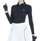 Black long-sleeved top with rhinestone embellishments and a turn-down collar.