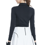 Black long-sleeved top with rhinestone embellishments and a turn-down collar.